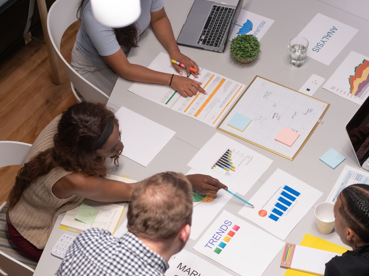 Growing small business team meeting together