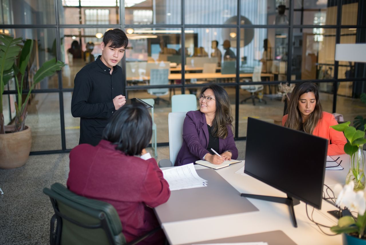 Business leaders meeting with an HR professional